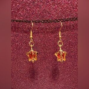 Gold Star Earrings with red crystal Accents